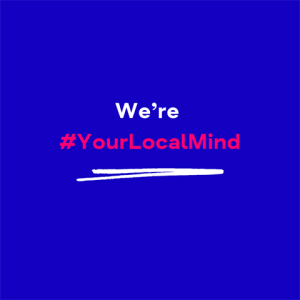 Text-based graphic with a solid blue background featuring the phrase "We're #YourLocalMind" in white and red bold letters.